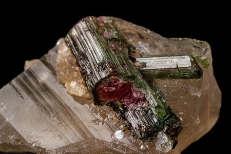 Macro stone tourmaline mineral on a black background close upの写真素材
