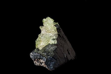 Macro stone Hyalite mineral, tourmaline Sherl, smoky quartz on a black background close-upの写真素材