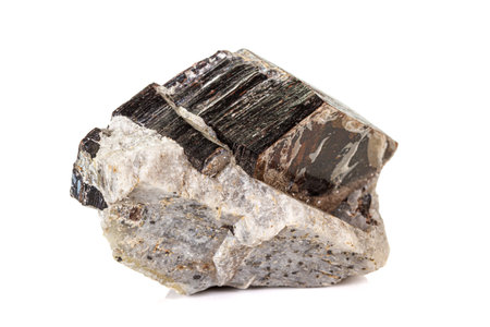 Macro of a mineral stone Vesuvianite on a white background close up