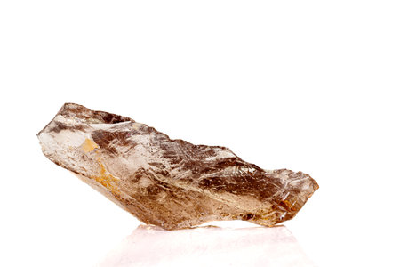 Macro stone mineral smoky quartz on a white background close up