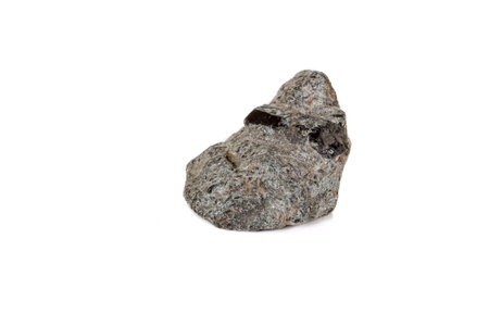 macro mineral stone schorl, black tourmaline on white background close up