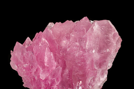 Macro pink quartz mineral stone on black background close upの写真素材