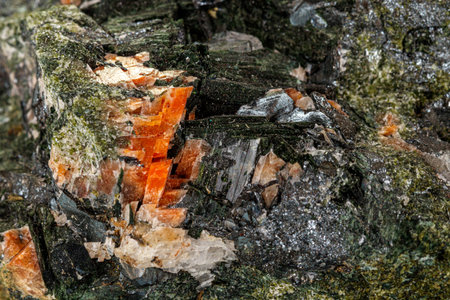 Macro stone mineral Diopside Calcite Magnetite on a white background close upの写真素材