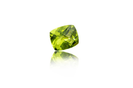 macro mineral stone cut Peridot on a white background close-upの写真素材