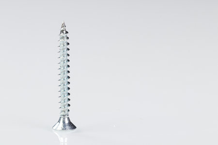 macro screws on a white background close-upの写真素材