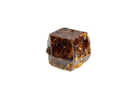 Grossular garnet mineral stone macro on white background close upの写真素材