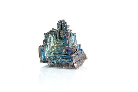 bismuth mineral stone macro on white background close up