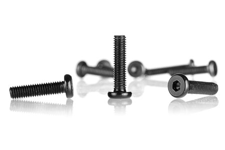 hex socket head screw in black color on isolated white background close upの写真素材