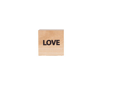wooden cubes with the inscription Love on a white isolated background close-upの写真素材