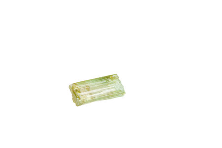 green tourmaline mineral stone macro on white background close upの写真素材
