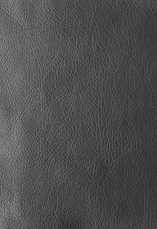 Texture of genuine leather, artificial leatherette black background close-upの写真素材