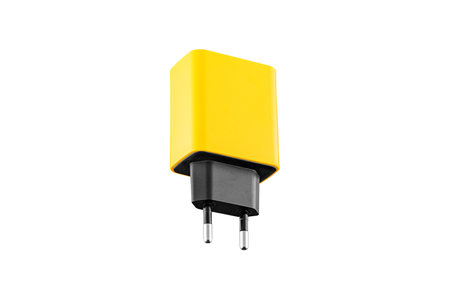 adapter for charger with USB and Type C connector, yellow, on isolated or white background close-upの写真素材