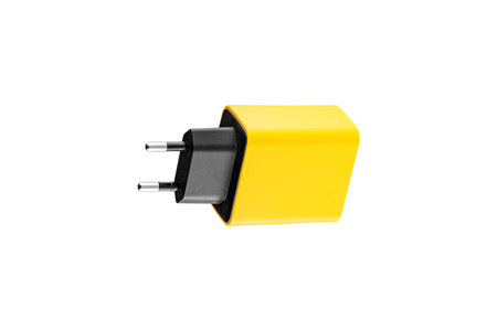 adapter for charger with USB and Type C connector, yellow, on isolated or white background close-upの写真素材