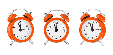 classic watch, pointer clock, Orange color alarm watch on isolated white background close up