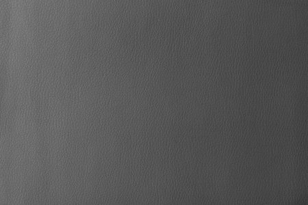 Texture of genuine leather, artificial leatherette gray background close-upの写真素材