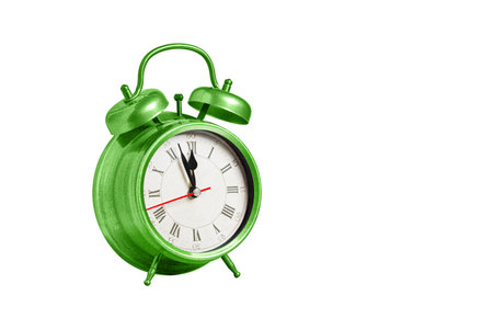 retro clock, pointer clock, green color alarm clock on isolated white background close upの写真素材