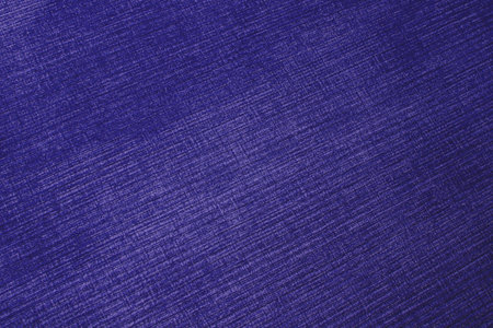 Textured corduroy furniture fabric in purple colors close-upの写真素材