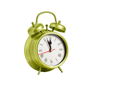 retro clock, pointer clock, green color alarm clock on isolated white background close upの写真素材