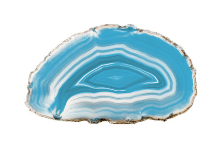 A painted Blue agate slice with white veins on a white background suits decor and craft projects. Its layered texture adds a natural elegance to various designs.の写真素材