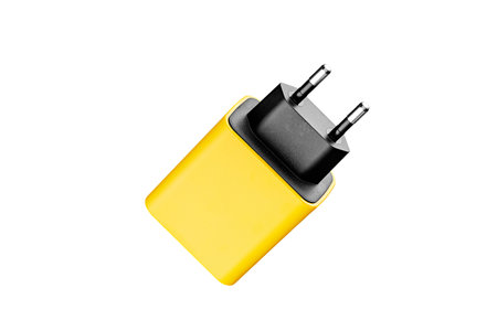 adapter for charger with USB and Type C connector, yellow, on isolated or white background close-upの写真素材