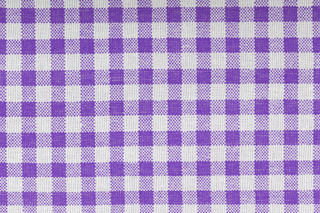Purple, violet and white checkered, pattern, design, cotton fabric for sewing, texture background close-upの写真素材