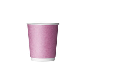 cardboard glass of pink color, for coffee or tea on an isolated white background close upの写真素材