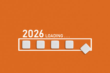 2026 Loading text on Orange backdrop. Ideal for business planning, financial trends, and future economic concepts, close upの写真素材