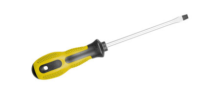 A flathead screwdriver with an ergonomic Yellow black handle suits various DIY projects. Its sturdy design ensures reliable performance on isolated white background close-upの写真素材