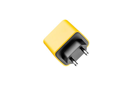 adapter for charger with USB and Type C connector, yellow, on isolated or white background close-upの写真素材