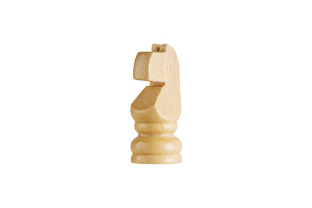 Macro shot of a wooden brown knight chess piece on white background. Ideal for strategy and gaming concepts.の写真素材