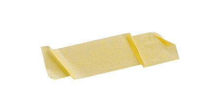 Yellow painter's tape isolated on white background, macro. Torn, crumpled, twisted strips of yellow painter's tape on white background, close-up.の写真素材
