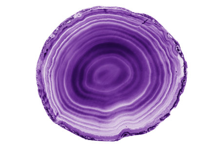 A painted Purple agate slice with white veins on a white background highlights nature's beauty. Its layered structure makes it a stunning natural decor piece.の写真素材