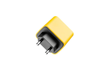 adapter for charger with USB and Type C connector, yellow, on isolated or white background close-upの写真素材