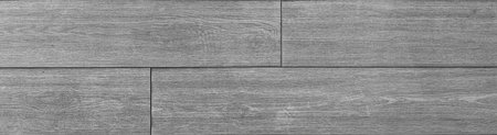 A wooden-style floor tile texture on a Gray background is ideal for construction. Its durable wood-like finish suits building and renovation needs.の写真素材