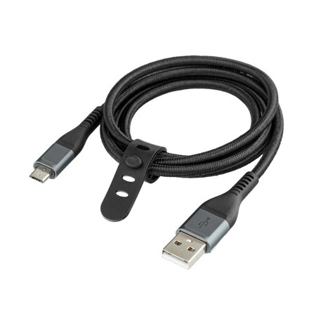 Black cable for charging and synchronization with Type - C, USB, Micro USB, Lightning connectors on a white background close-upの写真素材