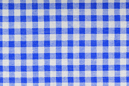 Blue and white checkered, pattern, design, cotton fabric for sewing, texture background close-upの写真素材