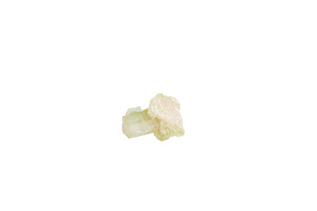 green tourmaline mineral stone macro on white background close upの写真素材