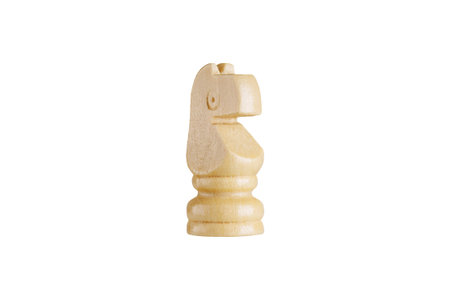 Macro shot of a wooden brown knight chess piece on white background. Ideal for strategy and gaming concepts.の写真素材
