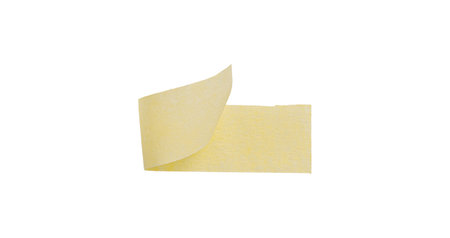 Yellow painter's tape isolated on white background, macro. Torn, crumpled, twisted strips of yellow painter's tape on white background, close-up.の写真素材
