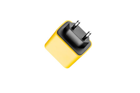 adapter for charger with USB and Type C connector, yellow, on isolated or white background close-upの写真素材