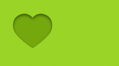 Green textured canvas background with heart shape cutout close upの写真素材