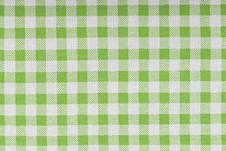 Green and white checkered, pattern, design, cotton fabric for sewing, texture background close-upの写真素材