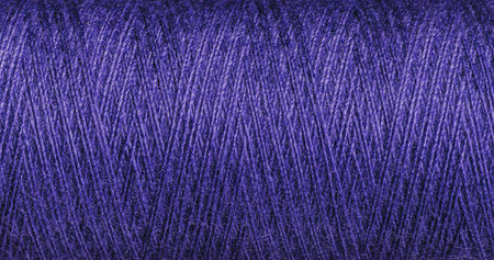 A Purple thread texture with weave suits various design projects. Its intricate pattern adds a vibrant depth to creative works.の写真素材
