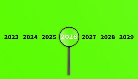 Lens, magnifying glass focusing on the year 2026 on a Green background. Financial or stock market...