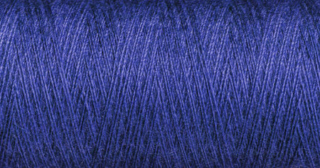 A Purple thread texture with weave enhances creative craft projects. Its detailed structure inspires...