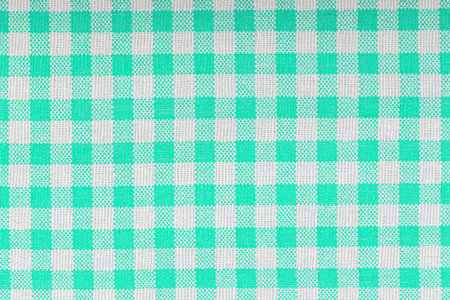 Green and white checkered, pattern, design, cotton fabric for sewing, texture background close-up
