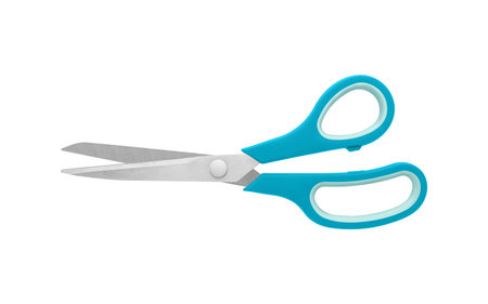A pair of blue handled scissors in open position on a white background, with sharp metal blades and...