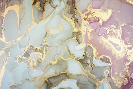 Luxury abstract painting in fluid art technique.Transparent layers of pastel pink and gold paints create marbled texture of stripes, swirls and veins with glowing gold and glitter. natural beautyの写真素材