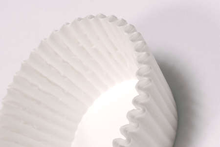 white muffin cup isolated on white backgroundの写真素材