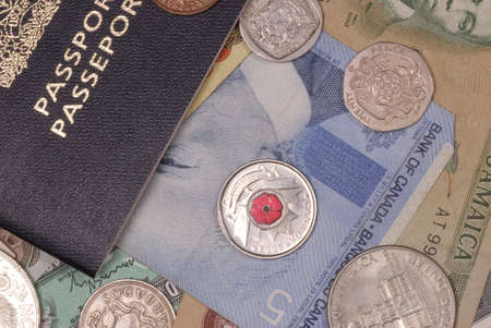 passport with money from several different countries from around the worldの写真素材